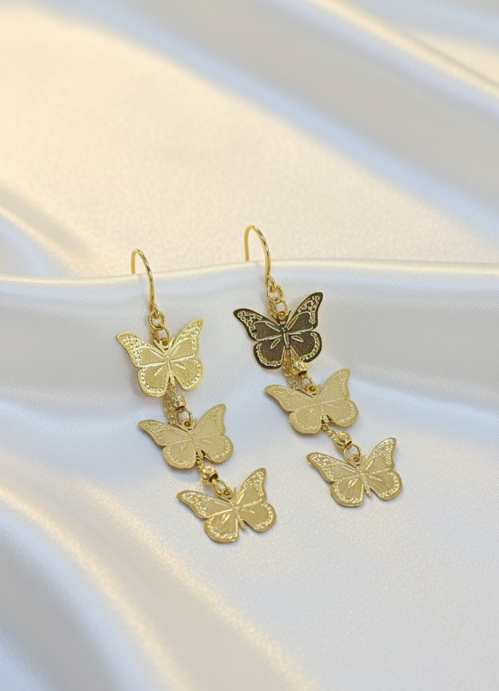 Gold Butterfly Cascade Statement Earrings