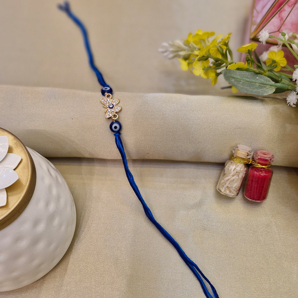 Evil Eye Butterfly Rakhi – Stylish Protection with a Touch of Grace