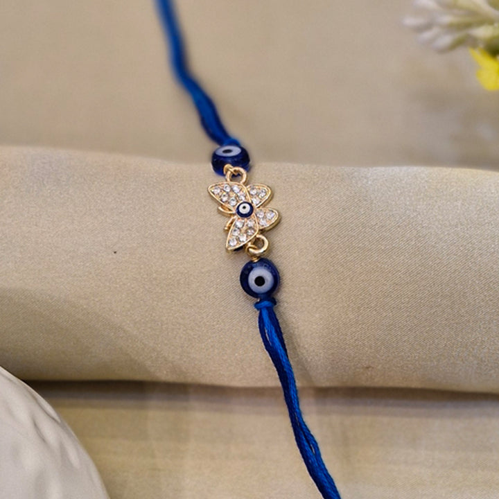 Evil Eye Butterfly Rakhi – Stylish Protection with a Touch of Grace