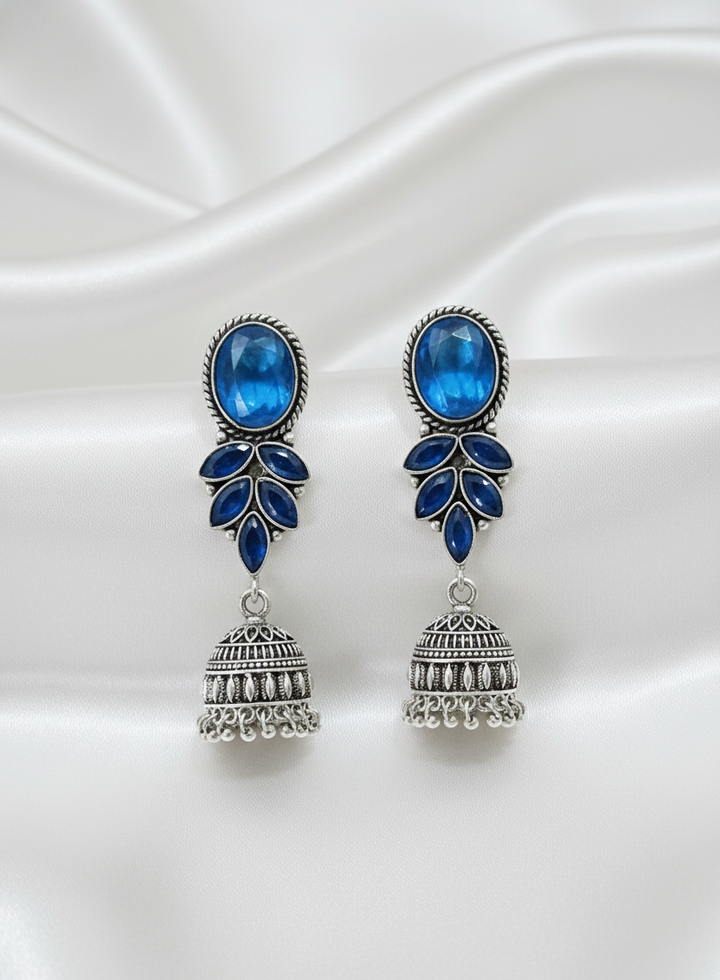 Royal Azure Jhumkas: Antique Silver-Finished Earrings with Cobalt Blue Crystals