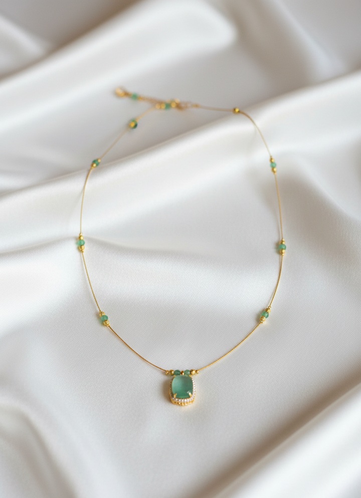 The "Aura" Floating Emerald Necklace – Minimalist Invisible Chain