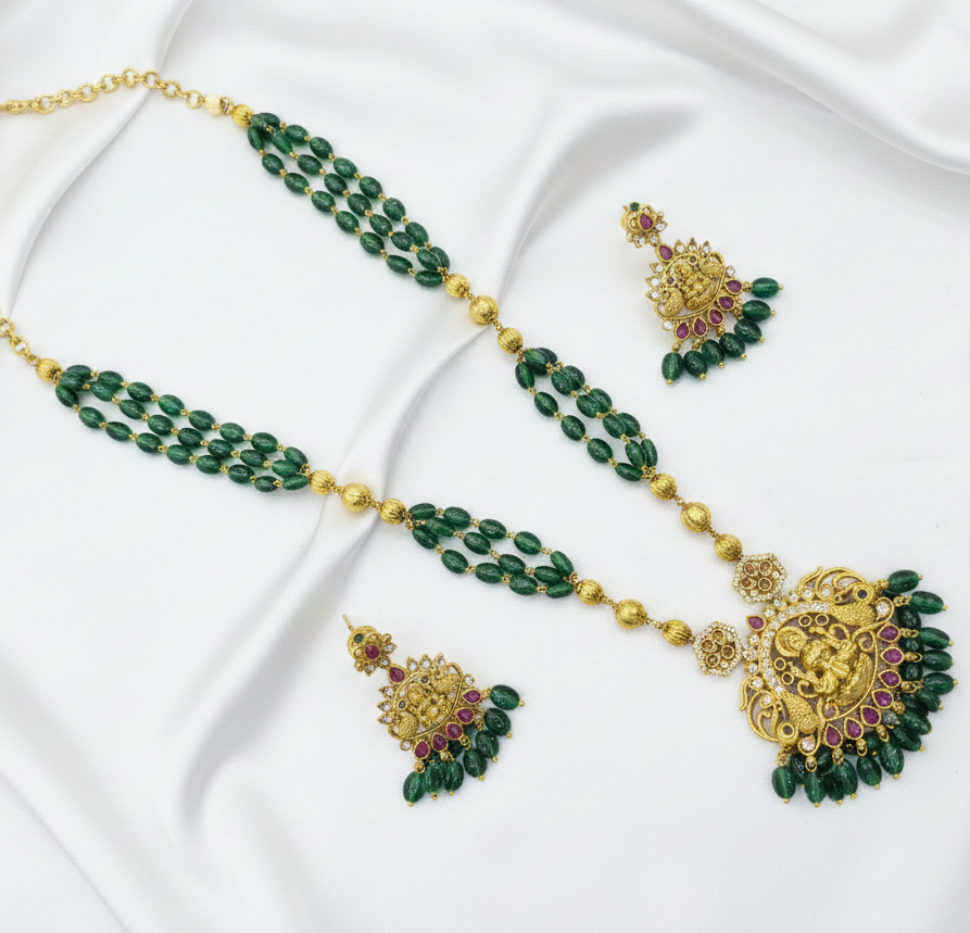 Antique Gold-Plated Lakshmi Pendant Necklace Set with Emerald Green Beads